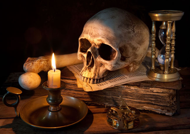 A skull and a candle.